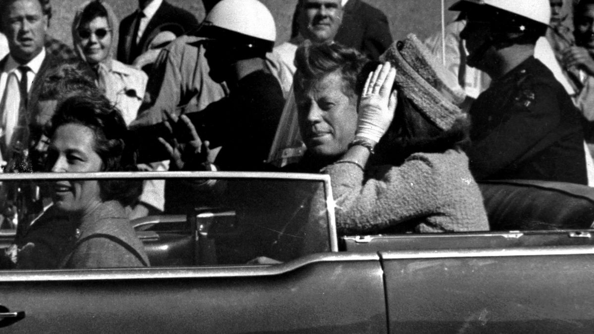 President John F. Kennedy waves from his car in a motorcade approximately one minute before he was shot, Nov. 22, 1963, in Dallas. File image/ AP President John F. Kennedy waves from his car in a motorcade approximately one minute before he was shot, Nov. 22, 1963, in Dallas. File image/ AP