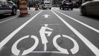 FILE - A bicycle lane along Market Street in Philadelphia, on June 4, 2018. (AP Photo/Matt Rourke, File)