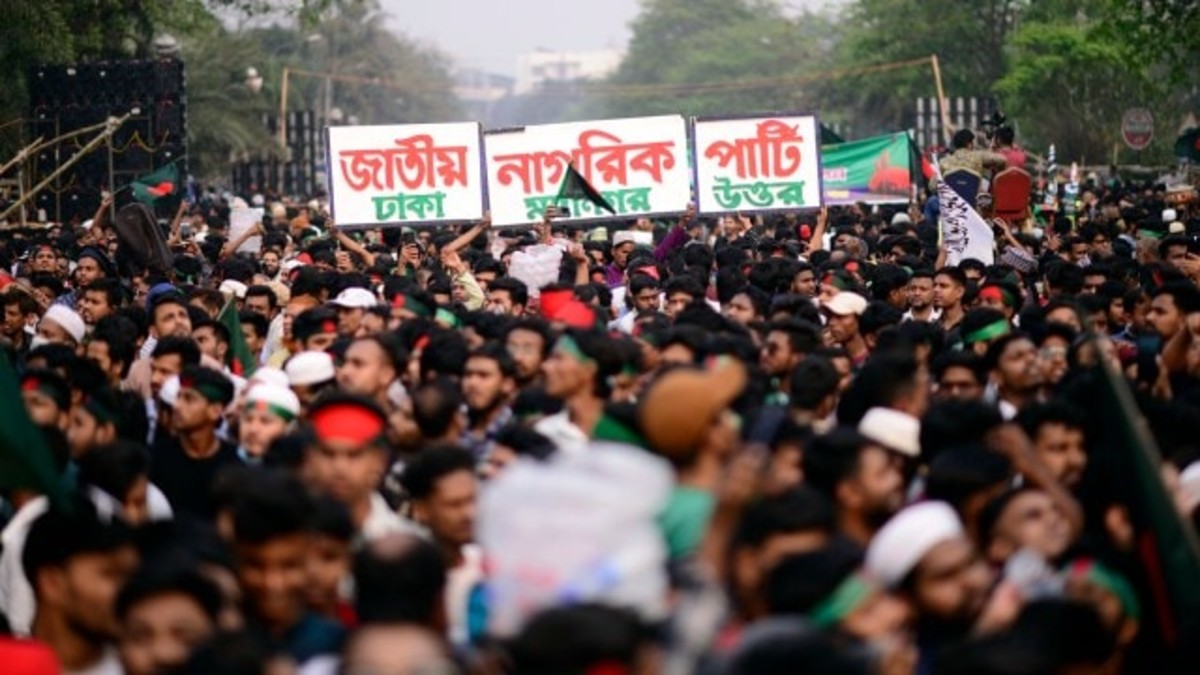 The Students Against Discrimination and Jatiyo Nagorik Committee—the groups that formed NCP—supported the propaganda that attacks against Hindus were mostly due to political reasons and were 'exaggerated' by Indian media. Image: Jatiya Nagarik Party or National Citizen Party, written on placard (AP Photo) The Students Against Discrimination and Jatiyo Nagorik Committee—the groups that formed NCP—supported the propaganda that attacks against Hindus were mostly due to political reasons and were 'exaggerated' by Indian media. Image: Jatiya Nagarik Party or National Citizen Party, written on placard (AP Photo)