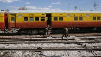 Pakistani soldiers board a relief train headed to Bolan, where a passenger train was attacked by Baloch separatists, at a railway station in Mach, Balochistan, Pakistan. (REUTERS)