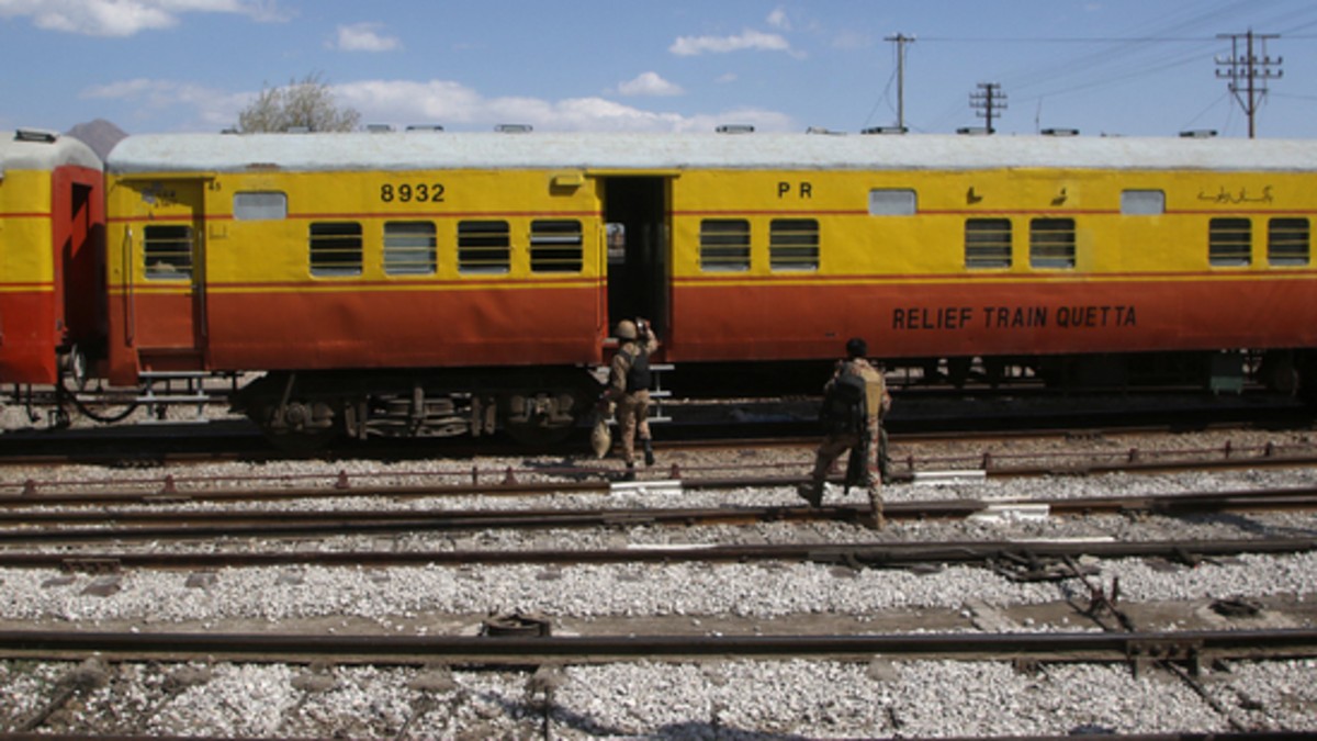 Pakistani soldiers board a relief train headed to Bolan, where a passenger train was attacked by Baloch separatists, at a railway station in Mach, Balochistan, Pakistan. (REUTERS) Pakistani soldiers board a relief train headed to Bolan, where a passenger train was attacked by Baloch separatists, at a railway station in Mach, Balochistan, Pakistan. (REUTERS)