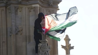 A pro-Palestinian protester climbed atop Elizabeth Tower, which houses Big Ben at the Palace of Westminster in London. AP