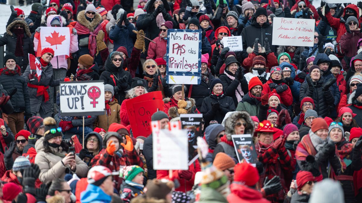 Protestors take part in a "Mothers out Front" demonstration against US President Donald Trump and Elon Musk near the United States embassy in Ottawa, Saturday, March 8, 2025. The Canadian Press via AP Protestors take part in a "Mothers out Front" demonstration against US President Donald Trump and Elon Musk near the United States embassy in Ottawa, Saturday, March 8, 2025. The Canadian Press via AP