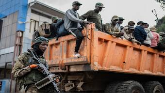 Former members of the Armed Forces of the Democratic Republic of Congo (FARDC) and police officers who allegedly surrendered to M23 rebels arrive in Goma, Congo, on Feb. 23, 2025. AP File