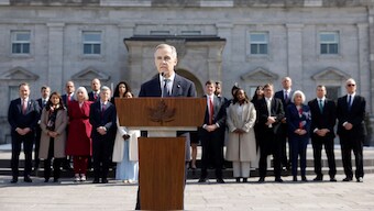 Canada's new Prime Minister Mark Carney, with members of his government standing behind him, speaks during a press conference following a swearing-in ceremony of the new Canada's government in Ottawa, Ontario, Canada, March 14, 2025. (Photo: Reuters)
