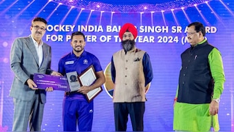 Harmanpreet Singh receives his Hockey India men's Player of the Year award. 
