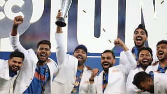 India captain Rohit Sharma lifts the Champions Trophy with teammates after their four-wicket victory over New Zealand in the final in Dubai on Sunday, 9 March. Reuters