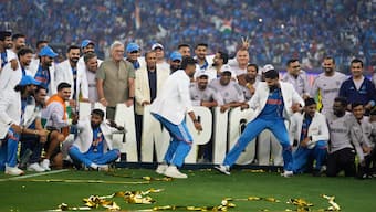 The Indian cricket team celebrates after receiving the trophy during the post-match presentation ceremony in the final of the ICC Champions Trophy in Dubai. AP