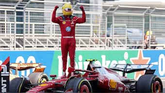 Lewis Hamilton reacts after winning the sprint race at the Chinese Grand Prix, collecting his first win since his high-profile move to Ferrari from Mercedes ahead of the 2025 season. Reuters