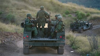 (File) Soldiers patrol near the hamlet Plaza Vieja in the Michoacan state of Mexico. The Mexican army acknowledged for the first time on August 2, 2024, that some of its soldiers have been killed by drug cartel bomb-dropping drones in the western state of Michoacan, without providing fatality numbers. AP