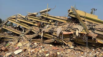 The ruins of Sky Villa Condo that collapsed in Friday's earthquake in Mandalay, Myanmar. AP