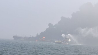 Fire and rescue service crews respond to a collision between oil tanker and a cargo ship off the northeastern coast of England in this picture obtained by Reuters on March 10, 2025. File Image/Reuters