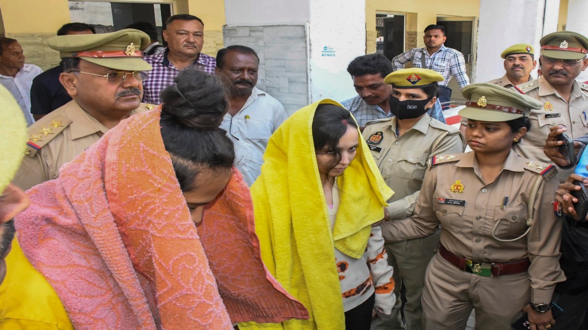 Police take away Merchant Navy officer Saurabh Rajput's wife Muskan and her lover Sahil Shukla after they were arrested in connection with his murder, in Meerut, Wednesday, March 19, 2025. PTI Police take away Merchant Navy officer Saurabh Rajput's wife Muskan and her lover Sahil Shukla after they were arrested in connection with his murder, in Meerut, Wednesday, March 19, 2025. PTI