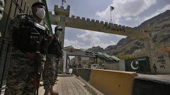 Pakistani paramilitary soldiers stand guard at Torkham border crossing, in Khyber district, Pakistan. AP