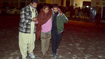 Passengers rescued by security forces from a passenger train attacked by insurgents arrive at a railway station in Quetta, Pakistan, on March 12, 2025. AP