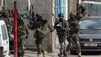  Israeli soldiers conduct a raid in the Al-ain camp for Palestinian refugees west of Nablus in the occupied West Bank, on March 19, 2025. Image- AFP