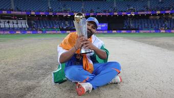 India captain Rohit Sharma poses with the winner's trophy after helping India win the 2025 ICC Champions Trophy with a four-wicket victory over New Zealand. Image: AP
