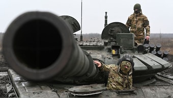 A Russian contract soldier listens to instructions of an officer while training onboard a T-72 tank during military drills held at a firing range amid Russia-Ukraine conflict, in the southern Krasnodar region, Russia, December 2, 2024. File Image/Reuters