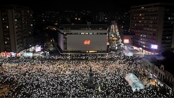 A drone view shows students and opposition supporters lighting up their mobile phone lights as they hold 15 minutes of silence during a protest over the fatal November 2024 Novi Sad railway station roof collapse, in Nis, Serbia. Reuters