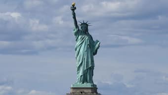 The Statue of Liberty is seen from the Staten Island Ferry in New York. AP