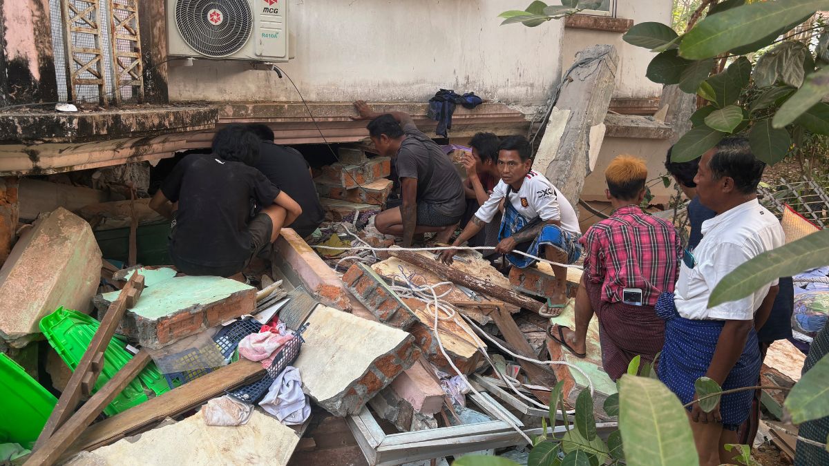 Volunteers look for survivors near a damaged building Friday, March 28, 2025, in Naypyitaw, Myanmar. AP Volunteers look for survivors near a damaged building Friday, March 28, 2025, in Naypyitaw, Myanmar. AP