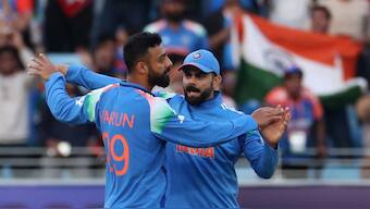 Playing his first match in Champions Trophy, Varun Chakravarthy took five wickets as India defeated New Zealand. Image: Reuters

