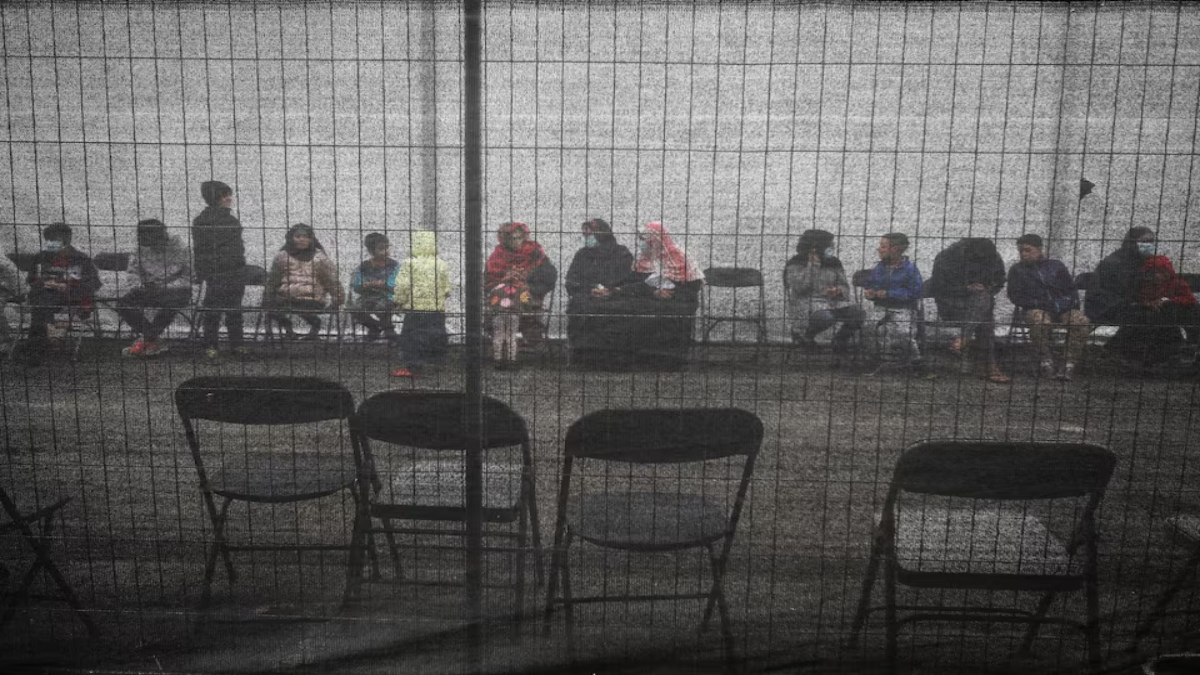 Afghan refugees queue outside a distribution and donation center at Liberty Village on Joint Base McGuire-Dix-Lakehurst in New Jersey, U.S., December 2, 2021. Reuters Afghan refugees queue outside a distribution and donation center at Liberty Village on Joint Base McGuire-Dix-Lakehurst in New Jersey, U.S., December 2, 2021. Reuters