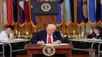 US President Donald Trump signs an executive order to shut down the Department of Education, during an event in the East Room at the White House in Washington, DC. Reuters
