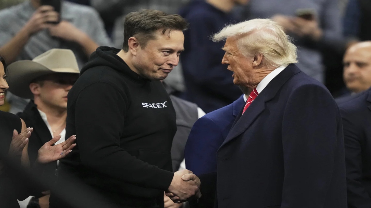 Elon Musk, left, shakes hands with President Donald Trump at the finals for the NCAA wrestling championship, Saturday, March 22, 2025, in Philadelphia. AP Elon Musk, left, shakes hands with President Donald Trump at the finals for the NCAA wrestling championship, Saturday, March 22, 2025, in Philadelphia. AP
