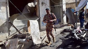 A security official checks the site of a bomb blast in Quetta, Pakistan, on Feb. 28, 2025. (AP)