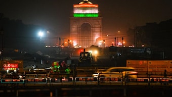 An illuminated India Gate war memorial in New Delhi.  AFP