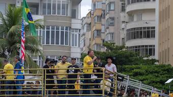 Brazil's former president Jair Bolsonaro (C) speaks during a rally in Copacabana, Rio de Janeiro, Brazil, on March 16, 2025. Facing a possible trial for attempted coup d'état, former Brazilian president Jair Bolsonaro called on his supporters to demonstrate this Sunday in Rio de Janeiro to show that he remains leader of the opposition ahead of the 2026 elections. (Source: AFP)