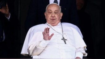Pope Francis gestures during his first public appearance in five weeks at the Gemelli hospital in Rome, Italy. Source: Reuters