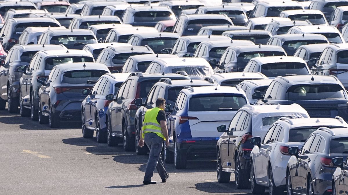 New German cars are stored at a logistic centre in Duisburg, Germany. AP New German cars are stored at a logistic centre in Duisburg, Germany. AP