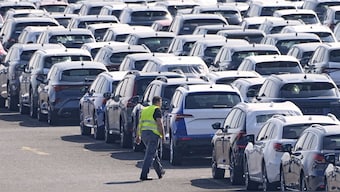 New German cars are stored at a logistic centre in Duisburg, Germany. AP