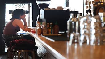 The United States fell to its lowest happiness ranking ever partly due to a rise in the number of Americans eating their meals alone, revealed the World Happiness Report. Representational image/AFP