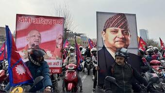 A poster of Uttar Pradesh Chief Minister Yogi Adityanath at a rally in support of former Nepal King Gyanendra Shah in Kathmandu on Sunday. Image Courtesy: @siddappa_jami/X