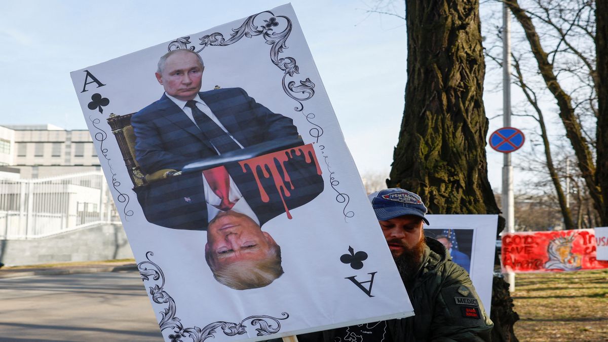 A demonstrator holds a banner depicting a playing card with portraits of Russian President Vladimir Putin and US President Donald Trump during a rally against Trump's stance on the Russia-Ukraine war in front of the US embassy in Kyiv, Ukraine. File image/Reuters A demonstrator holds a banner depicting a playing card with portraits of Russian President Vladimir Putin and US President Donald Trump during a rally against Trump's stance on the Russia-Ukraine war in front of the US embassy in Kyiv, Ukraine. File image/Reuters