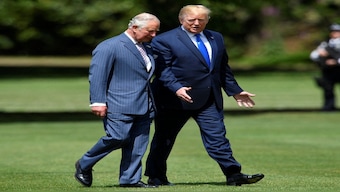 US President Donald Trump walks with Britain's King Charles. The US president said he liked the idea of the United States joining the British Commonwealth after a report claimed King Charles III would make an offer. File image/AFP

