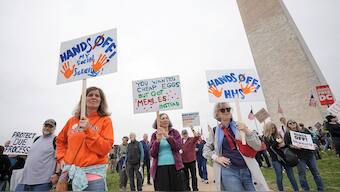 Demonstrators rally against U.S. President Donald Trump and his adviser Elon Musk during a 'Hands Off!' protest on the Washington Monument grounds, in Washington, D.C., U.S. Reuters