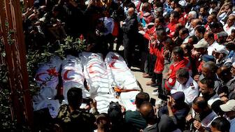 Palestinians mourn medics who came under Israeli fire, Khan Younis. Reuters