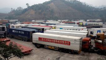 Container trucks are seen while waiting for cross the border at Huu Nghi border gate connecting with China, in Lang Son province, Vietnam. File image/ Reuters