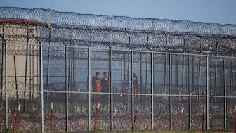 Detainees stand inside the Bluebonnet Detention Facility, after the U.S. Supreme Court on Saturday temporarily barred U.S. President Donald Trump's administration from deporting Venezuelan men in immigration custody, in Anson, Texas, US. Reuters 