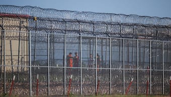 Detainees stand inside the Bluebonnet Detention Facility, after the U.S. Supreme Court on Saturday temporarily barred U.S. President Donald Trump's administration from deporting Venezuelan men in immigration custody, in Anson, Texas, US. Reuters 