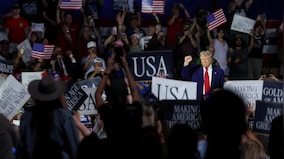 At 100-day rally, Trump defends trade policies, slams ‘radical left lunatics’