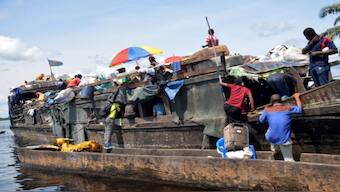Rescue efforts continue after the fire and sinking of a boat on the Congo River. AFP