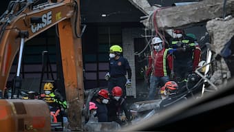 Rescue teams work at the Jet Set nightclub following the collapse of its roof in Santo Domingo on April 9, 2025. AFP