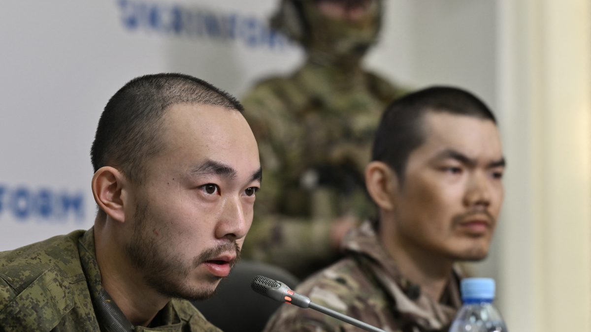 Chinese prisoners of war Zhang Renbo (L) and Wang Guangjun (R) address the audience during a press conference in Kyiv on April 14, 2025. AFP Chinese prisoners of war Zhang Renbo (L) and Wang Guangjun (R) address the audience during a press conference in Kyiv on April 14, 2025. AFP