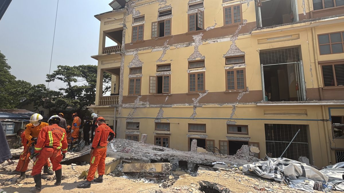 Rescuers work at U Hla Thein Buddhist monastery that collapsed in Friday's earthquake in Mandalay, Myanmar. AP Rescuers work at U Hla Thein Buddhist monastery that collapsed in Friday's earthquake in Mandalay, Myanmar. AP