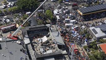 Rescue workers search for survivors at the Jet Set nightclub after its roof collapsed during a merengue concert in Santo Domingo, Dominican Republic. AP